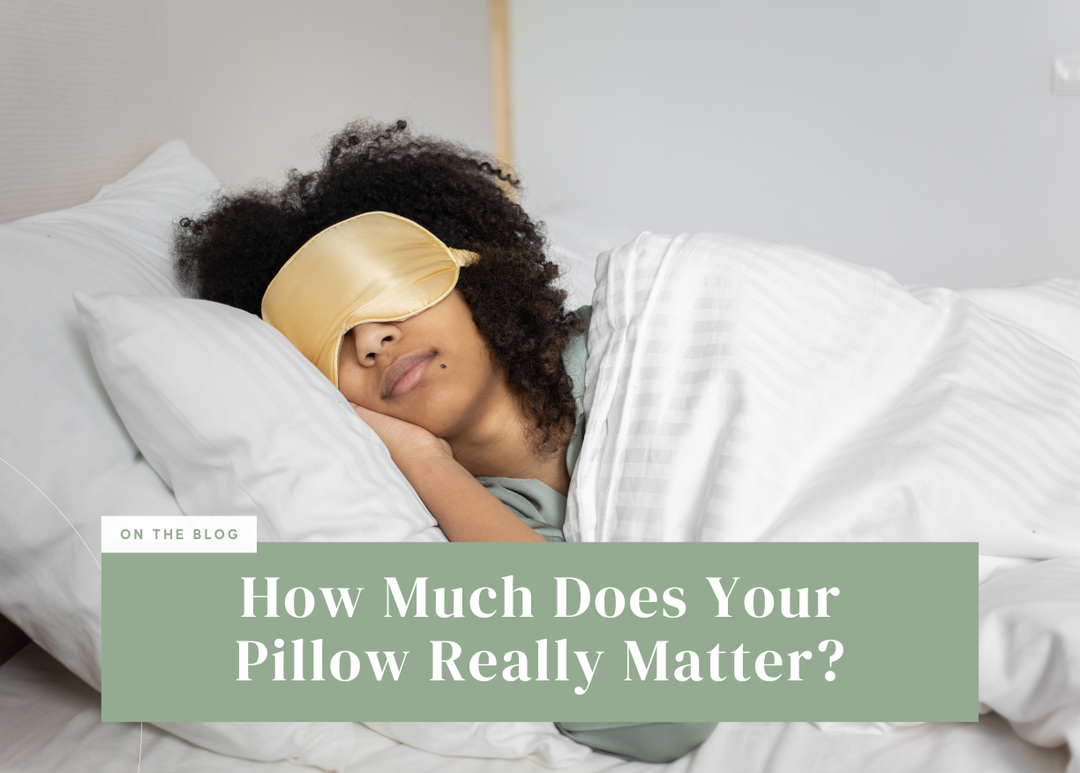 Woman wearing a sleep mask sleeping comfortably on a supportive pillow.