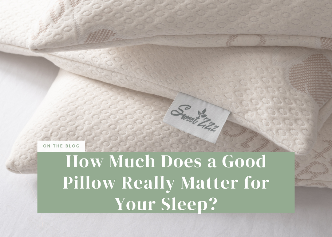 Stack of soft white Sweet Zzz pillows featuring a visible brand tag.