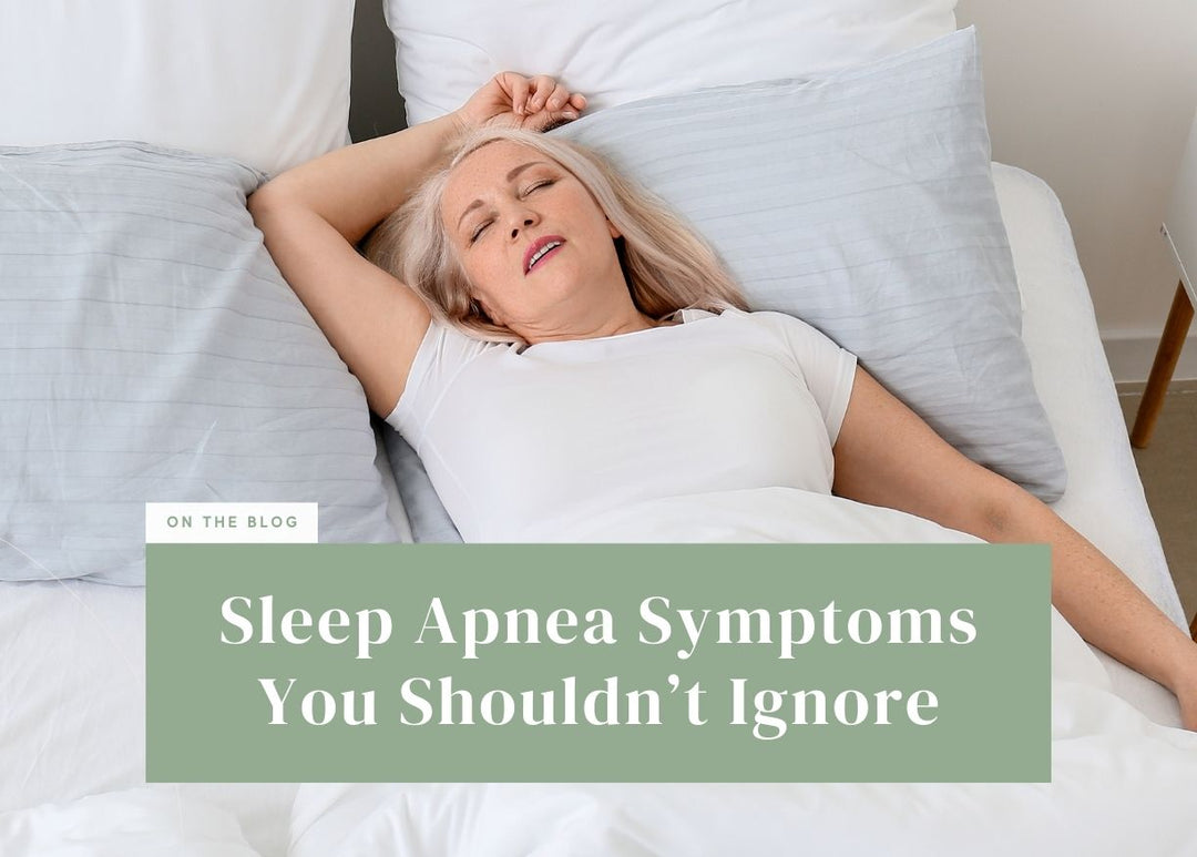 Older woman sleeping restless on her back with her mouth slightly open.