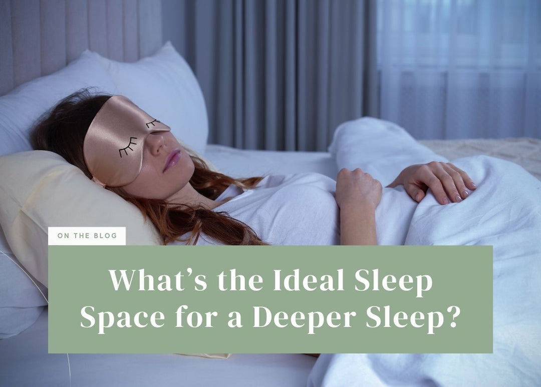 Woman sleeping peacefully on her back wearing a gold sleep mask.